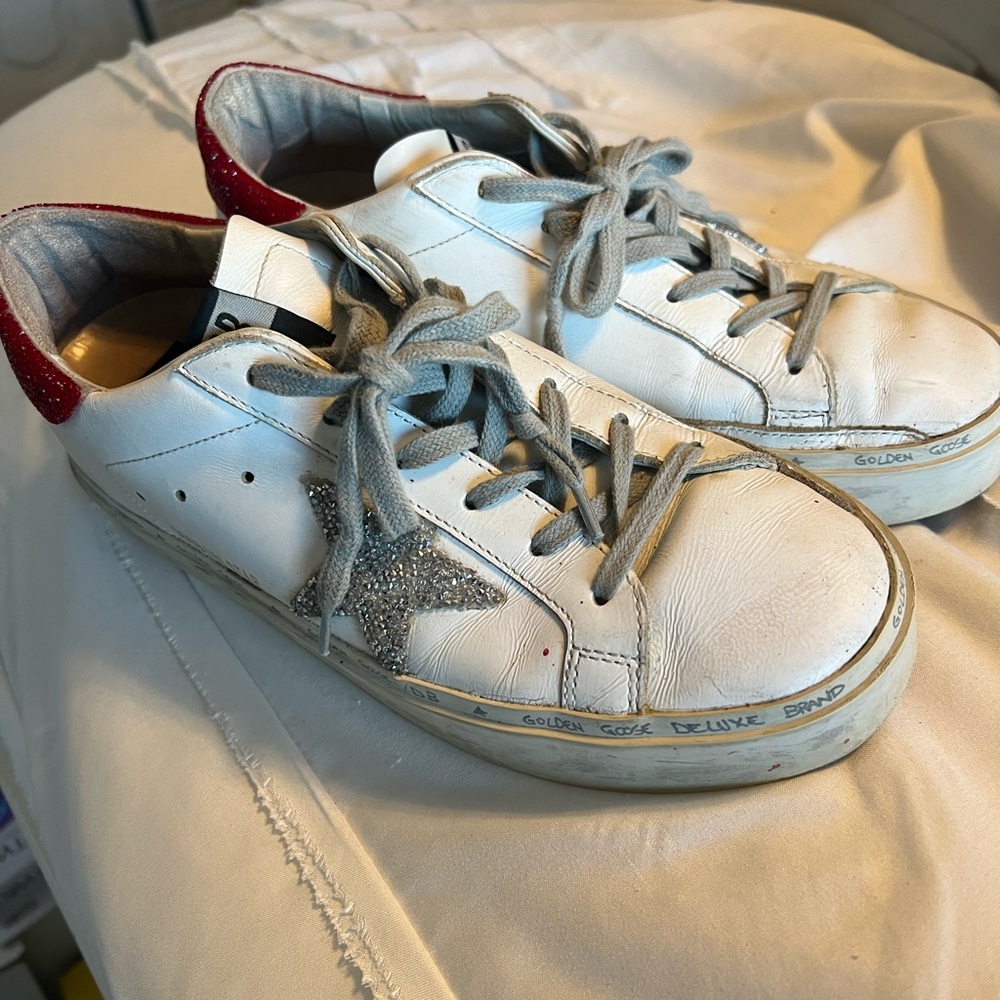 Golden Goose with red sparkly trim and silver star.